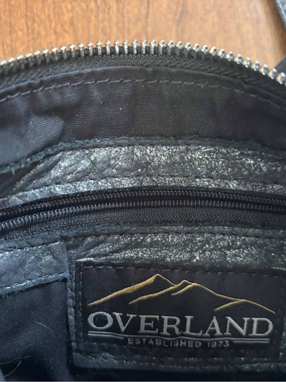Overland Sheepskin Co Metallic Grey Crossbody Purse